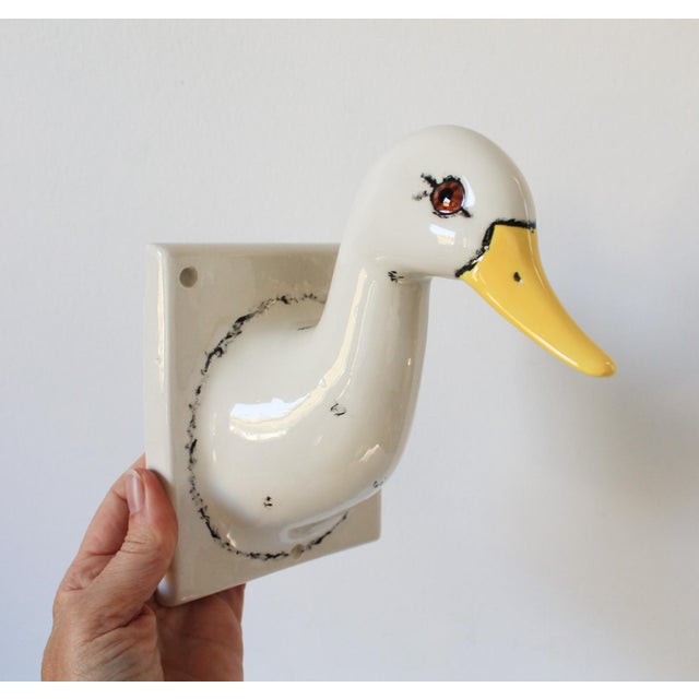 Vintage wall mounted ceramic duck towel or apron holder. No makers mark. No chips or cracks.