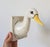 Vintage wall mounted ceramic duck towel or apron holder. No makers mark. No chips or cracks.