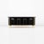 This stunning and distinct black lacquered and brass detail credenza or sideboard by Mastercraft. Meticulous attention to...