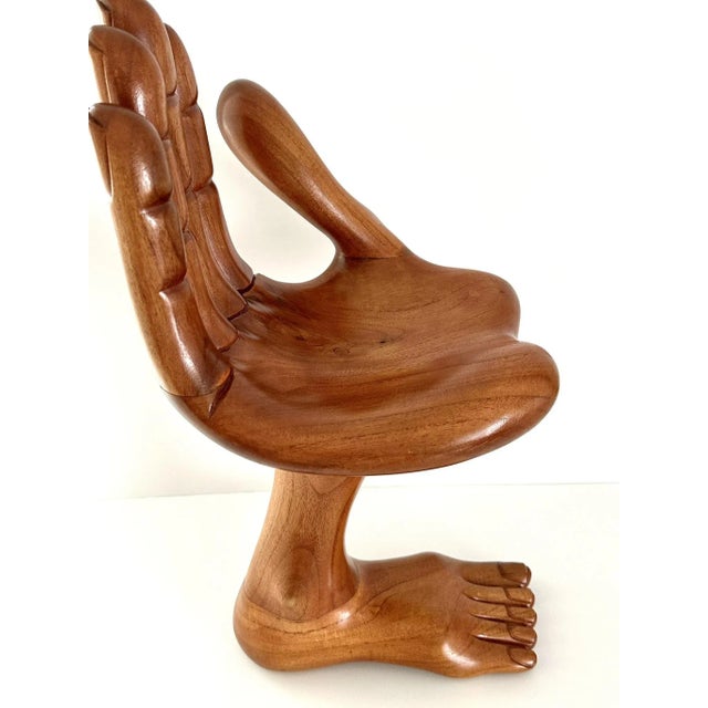 An iconic foot sculpture by celebrated Mexican American surrealist artist Pedro Friedeberg (1936-), circa 1960s. The wood...