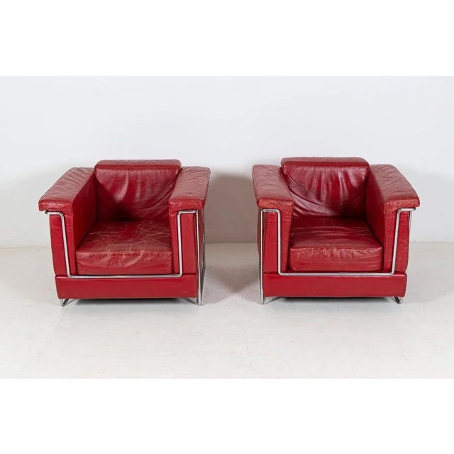 Circa Mid/Late 20thC Pair of mid century leather armchairs Great form and patination. Measures: W 84 x D 67 x H 72 cm seat...