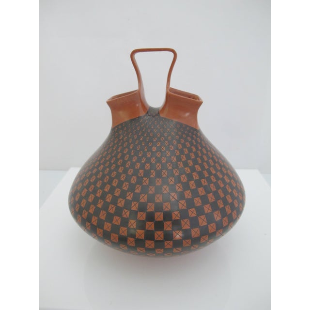 Mata Ortiz Mexican wedding vase, handcrafted by artist Olga Quezada. Traditional wedding vase or olla with a unique...