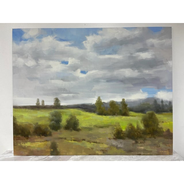 A stunning impressionistic landscape oil painting on canvas, featuring a rich blend of greens, blues, and earthy tones....