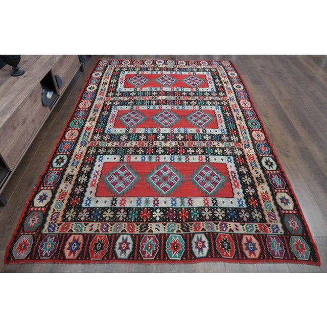 Vintage Turkish Hand-Knotted vintage rug is a semi-antique vintage area rug.'70s Eastern region of Turkey's unique rug is...