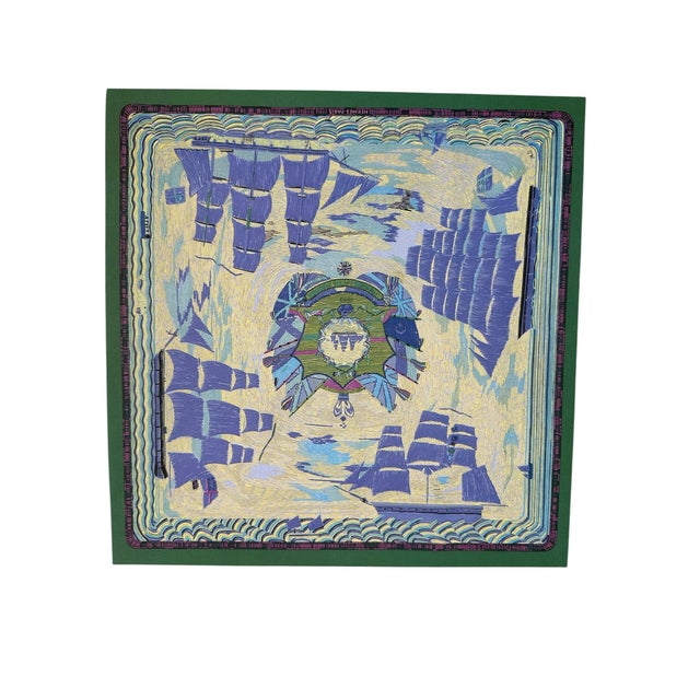 Authentic Original Hermès, this striking maritime art print features an elegant composition of historic sailing ships...