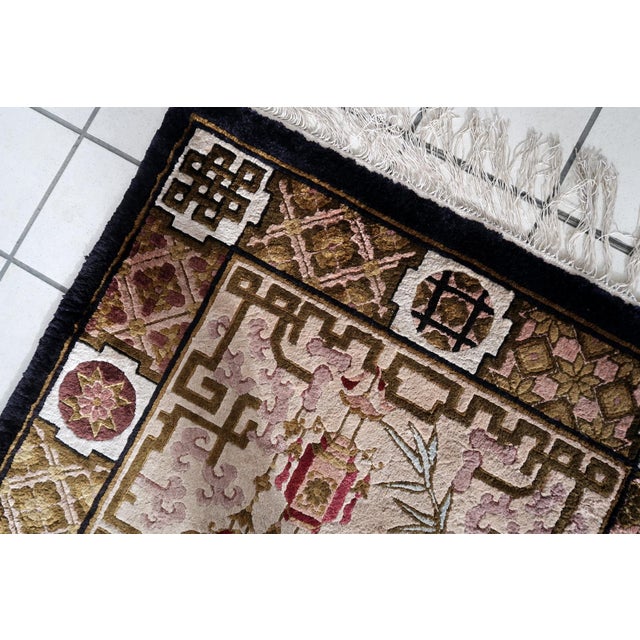 Introducing our exquisite Vintage Art Deco Chinese Silk Rug from the 1960s, measuring 2.9’ x 5’ and exuding timeless...