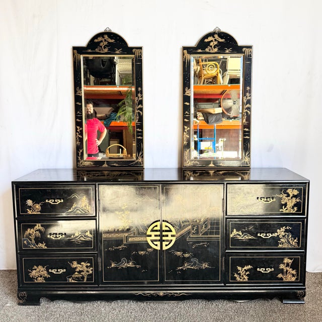 Bring timeless elegance into your home with this stunning Vintage Chinese Black and Gold Hand-Painted Dresser with...