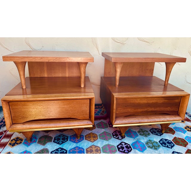Vintage nightstand saw limited production and therefore are somewhat rare and hard to find. With a solid poplar frame and...