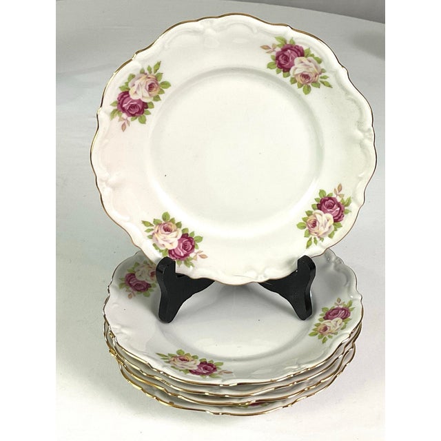Vintage- Winterling- Bavaria-tea and coffee service 23 pieces Porcelain – decorated with rose sprigs-scalloped edges and...