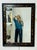 A sophisticated John-Richard (Mississippi) wall mirror featuring a richly detailed faux tortoise shell frame bordered by...
