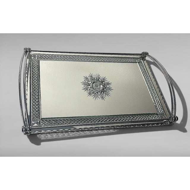 An elegant rectangular Art Deco tray, produced between 1930 and 1935, likely in one of the many workshops active in the...