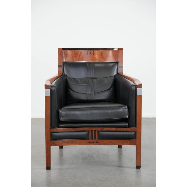 We are offering these black leather Art Deco Schuitema design armchairs from the Decoforma series. A piece of furniture...