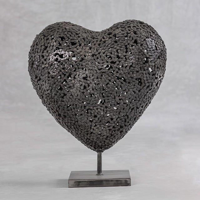 Metallic Beats – Industrial Steel Heart Sculpture Metallic Beats is a handcrafted industrial heart sculpture made from...