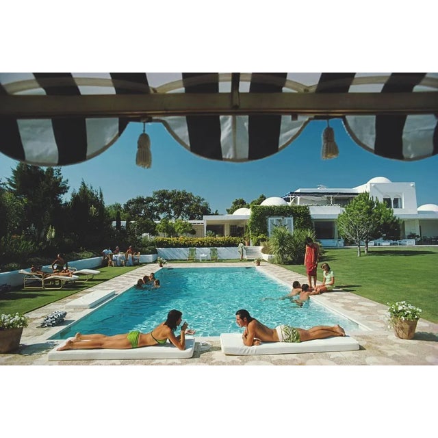 Pool in sotogrande' slim aarons estate print giant estate stamped limited edition print by slim aarons bathers round a...