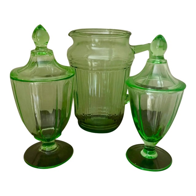 Set of Green Glass Pitcher and Two Canasters For Sale