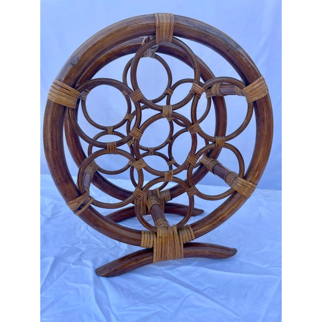 Vintage Tiki bar top bamboo and rattan seven bottle wine rack, wine storage, wine basket. The basket is open on both ends...