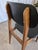 Vintage dining chairs are made in mid-century style from wooden base and black leatherette seat and backrest. Chairs were...
