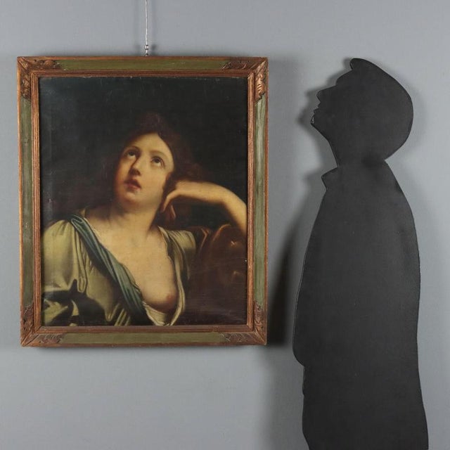 Oil on canvas. This ecstatic female face is inspired by the school of Guido Reni, captured in a half-length close-up, her...