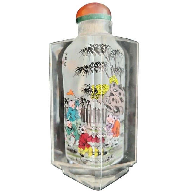 Vintage Signed Chinese Inside-Painted Glass Snuff Bottle – Rare Triangular Form Elevate your collection with this...