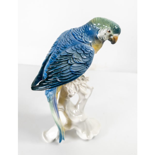 We are selling this nice porcelain figure of a Macaw parrot. This porcelain figure is well modeled with a soft colorful...