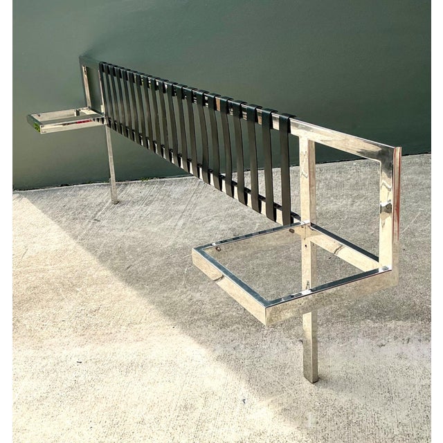This vintage chrome and leather king-size headboard is a striking homage to the modernist design language associated with...