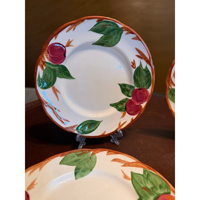 This set of four Franciscan Apple Salad Plates is a charming addition to any table setting. Hand-painted with a vintage...