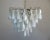 Italian vintage murano chandelier made by 50 glass petals "rondini" (transparent and white “lattimo”) in a chrome frame....