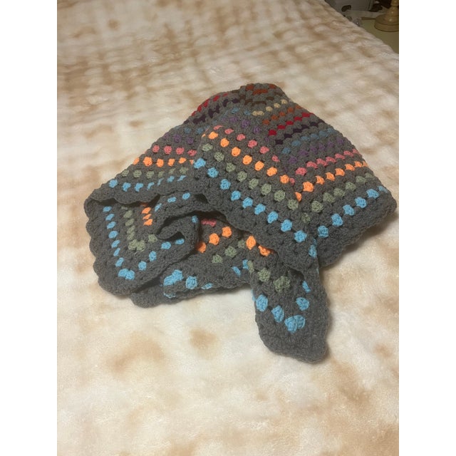 Hand-Crocheted Retro Granny Square Throw Blanket Add a touch of timeless charm and cozy comfort to any room with this...
