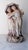 The hand-painted blue crossed swords mark with a dot or star on the underside identifies this figurine as being in the...