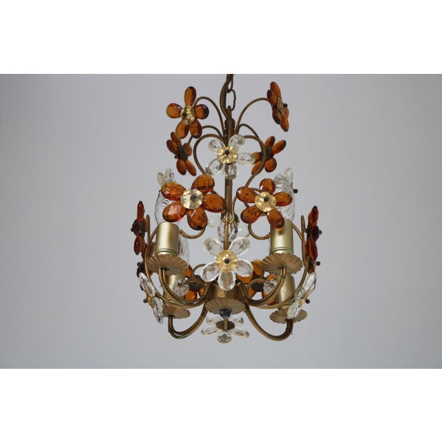 Romantic and elegant Mid-Century Italian flower chandelier from the 1950s, combining playful charm with timeless...