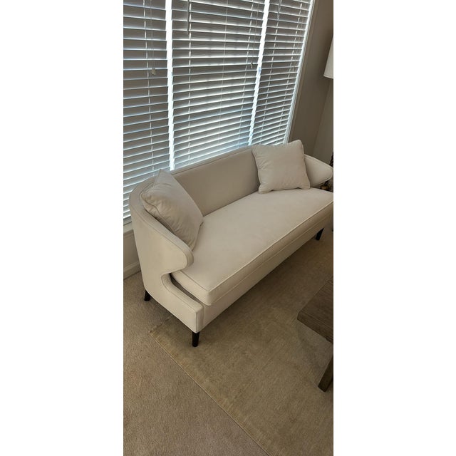 Gabriella White With its mid-century inspired rounded back, the Monroe Settee surrounds with comfort. A low back, smooth...