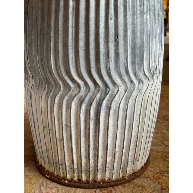 This is a pair of vintage garden stools. They have a rippled design in them. They would look beautiful in any home.