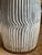 This is a pair of vintage garden stools. They have a rippled design in them. They would look beautiful in any home.