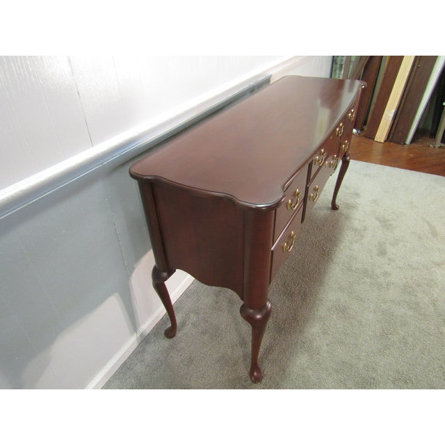 Item: Harden solid cherry Queen Anne sideboard. Age: 1990's. Details: Dovetailed drawers. Condition: Very clean excellent...