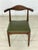 For sale is a stylish chair in a minimalist retro design in the Danish style, featuring an invitingly curved backrest made...