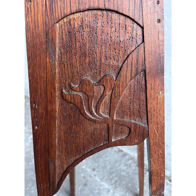 An elegant Art Nouveau plant stand dating from the early 20th century. Crafted from solid wood, its tall and slender...