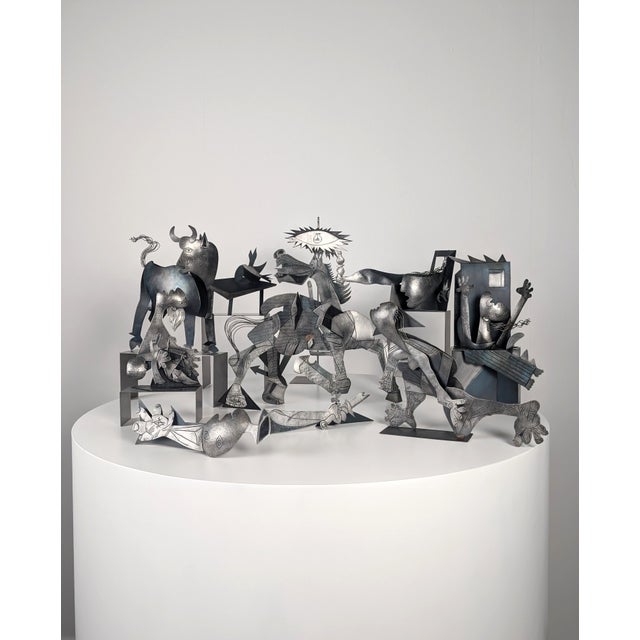 A striking large-format metal sculptural group reinterprets Pablo Picasso's iconic mural Guernica in three dimensions....
