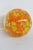 This wonderful circular Paper Weight is made of art glass. This gorgeous vintage piece features vibrant orange and yellow...