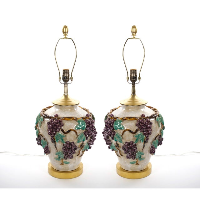 A striking pair of Italian mid-century modern table lamps, crafted in Italy during the mid to late 20th century and...
