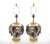 A striking pair of Italian mid-century modern table lamps, crafted in Italy during the mid to late 20th century and...