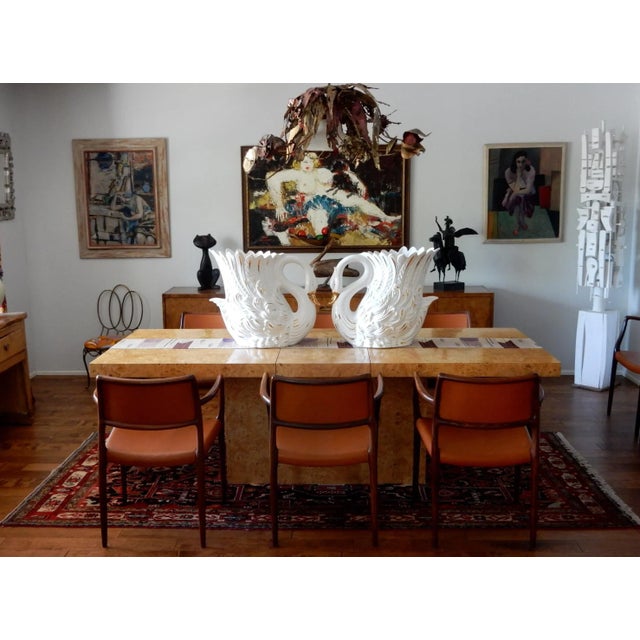 Stunning pair of vintage ceramic swan cachepots. Creamy white glaze with 24-karat gold accents. Large, life-size pieces as...