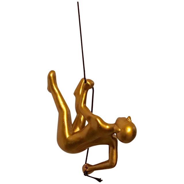 Large Gold Climbing Man For Sale
