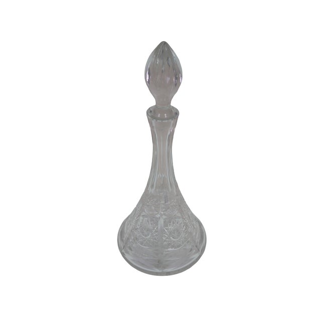 Vintage American Brilliant cut crystal liquor decanter featuring a distinctive pinwheel and star pattern. Dimensions: 6.5"...