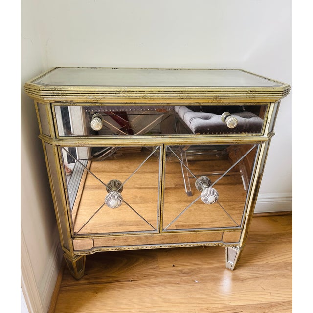 Fabulous Vintage mirrored commode with one drawer and two doors, in Hollywood Regency Style.