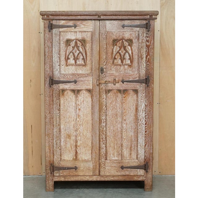 English Tudor Furnishings solid oak hand carved Cotswold style wardrobe. This item is part of a suite as mentioned, I have...