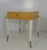 Elegant Italian side table produced in the 1980s, distinguished by a refined combination of maple wood, cream lacquer and...