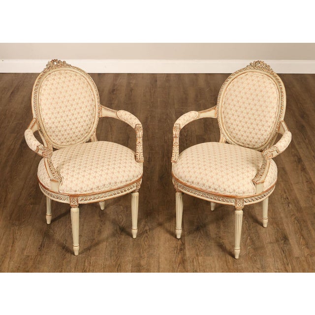 High Quality Pair of Upholstered Fauteuil Armchairs with Distressed Cream Painted Finish By Invincible IPF.