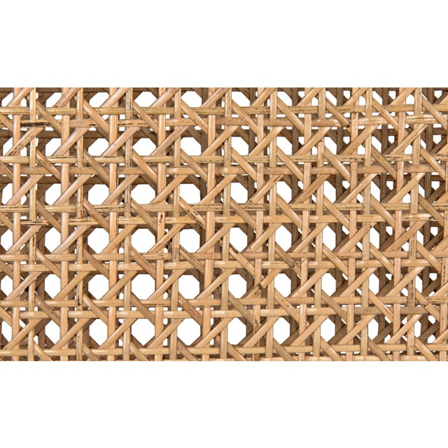 Mahogany with a hand-rubbed black finish contrasts strikingly with squares of naturally finished caning to create these...