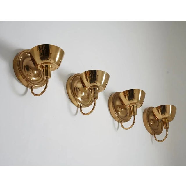 Stunning wall sconces model 2389 by Josef Frank for Svenskt Tenn. The lamps give a soft secondary light as the reflectors...