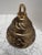 Large textured brass metal bell. antiqued finish either leaf pattern design. Pretty decor accent or to hang by the loop.